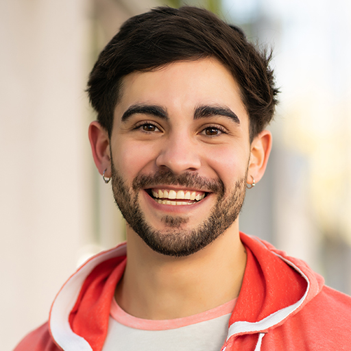 close-up-of-young-man-smiling-outdoors-DELEX88.jpg